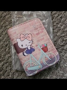 Pink Hello Kitty Zip Wallet with Bicycle Design